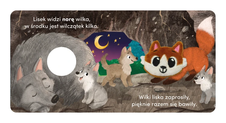 Wnętrze książki z pacynką pt. Mały lisek przedstawiające liska i wilki w wilczej norze