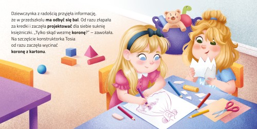 Wnętrze książki pt. Odjazdowe księżniczki. Zosia na balu przedstawiające dwie dziewczynki rysujące przy stoliku