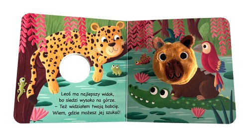 Wnętrze książki Kocham cię. Mała kapibara z widoczną pacynką kapibary przedstawiająca bohaterkę w towarzystwie papugi, krokodyla oraz lamparta